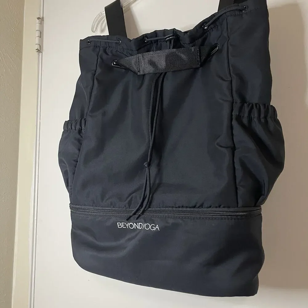 Beyond Yoga convertible gym bag black backpack with drawstring closure
